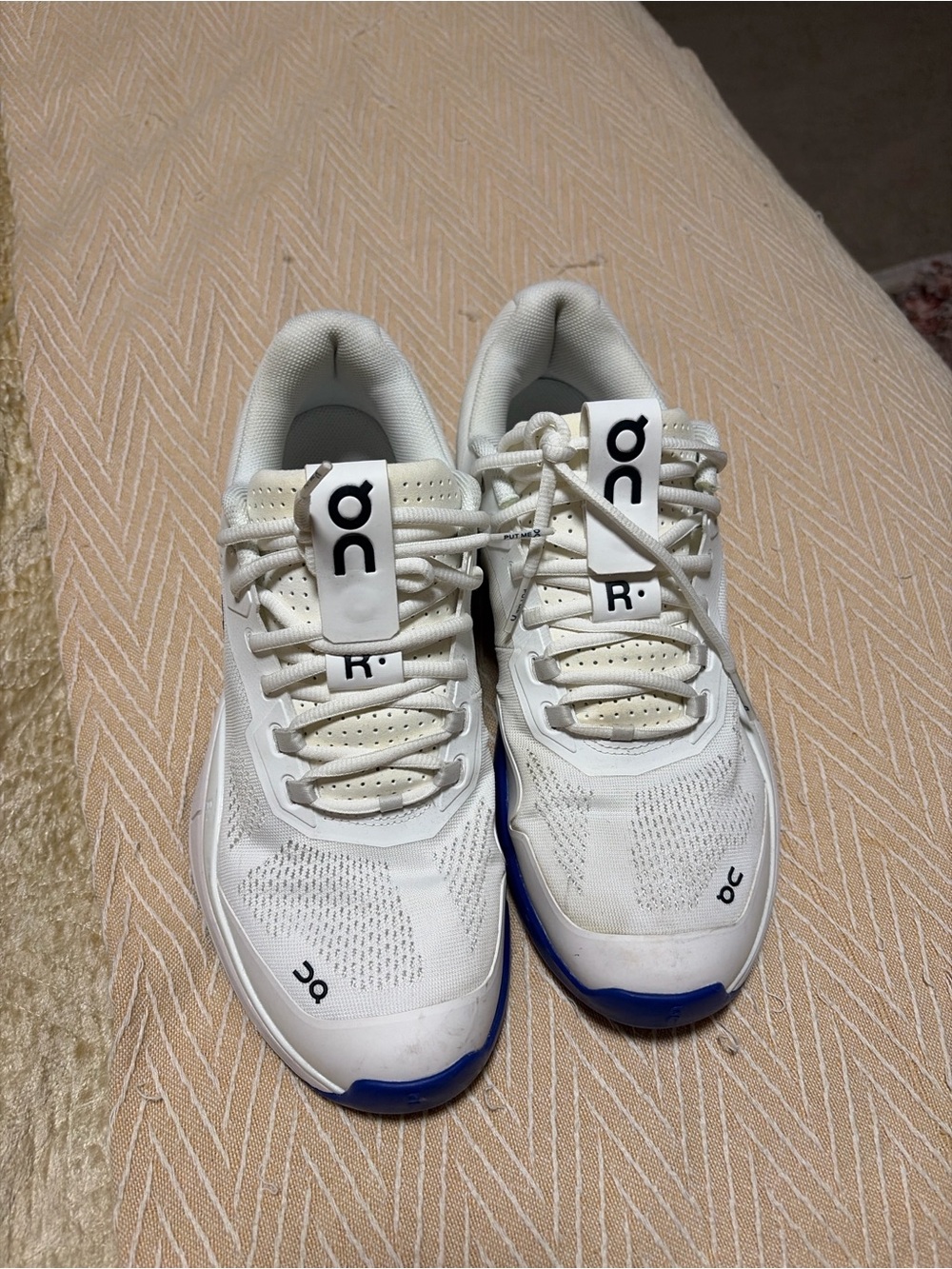 On Running Men's Athletic Sneakers in White with Blue Accents
